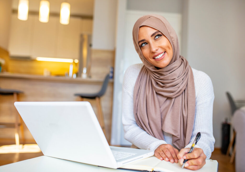 woman taking notes