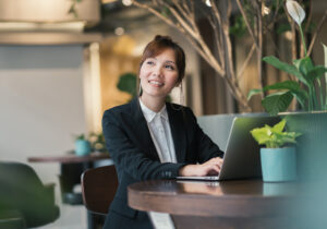 Woman in office with plants