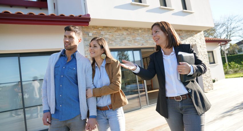 couple with real estate agent